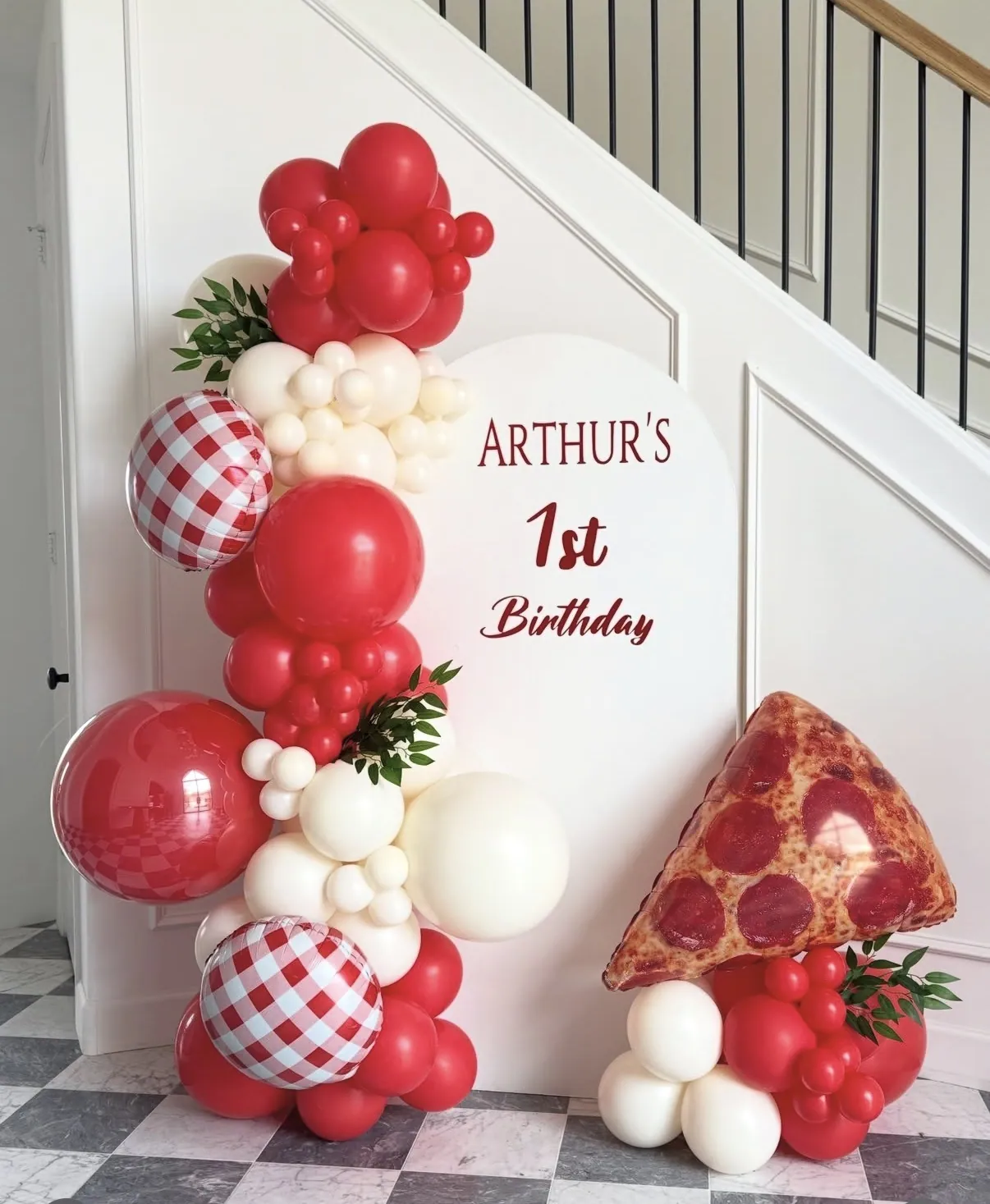 Red, cream and gingham balloon garland with a giant foil pizza slice.